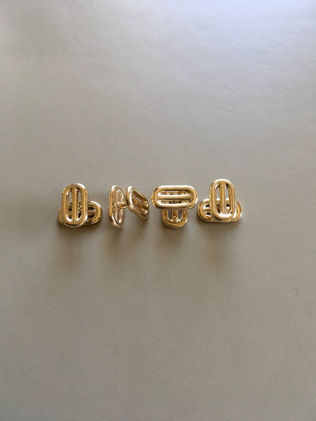 4 bar set of studs in 18kt Yellow Gold